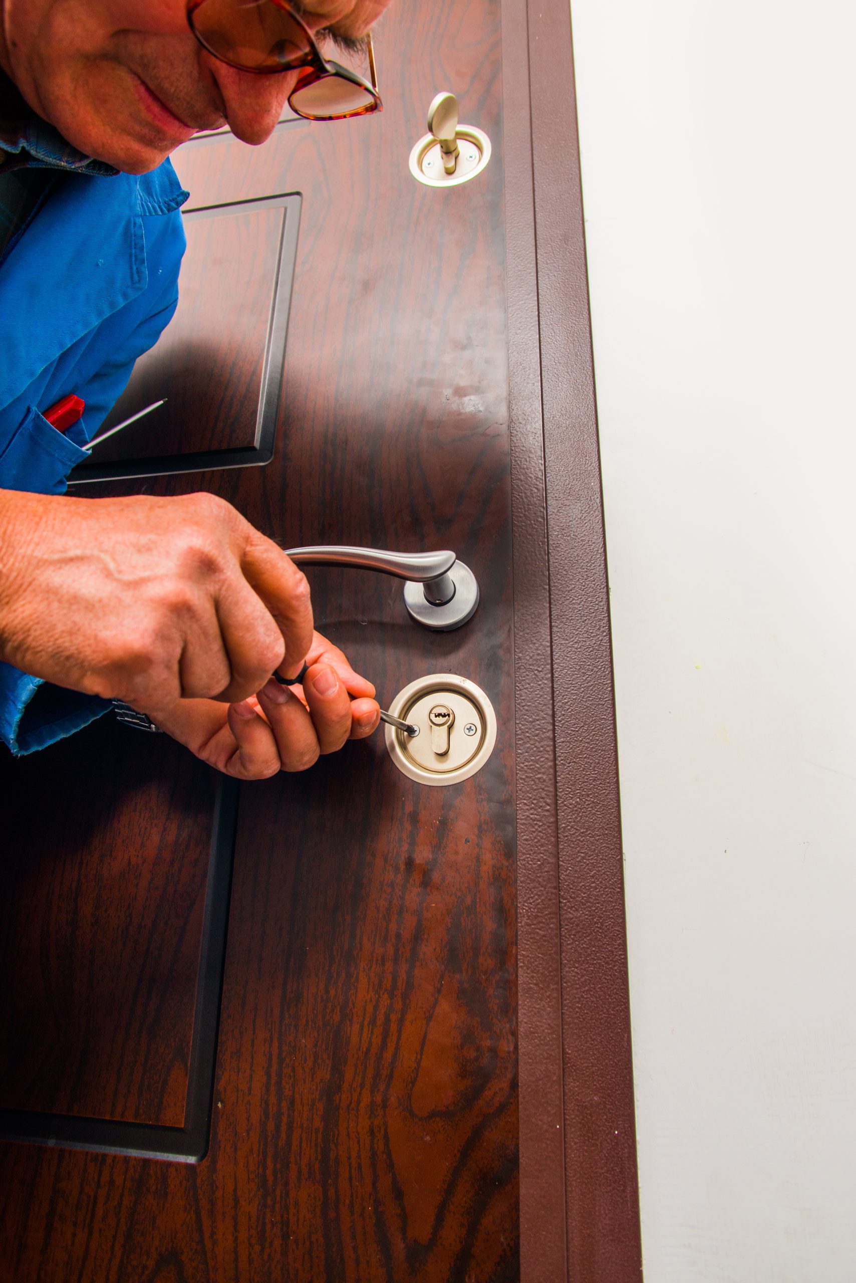 Handyman Fixing Door Lock